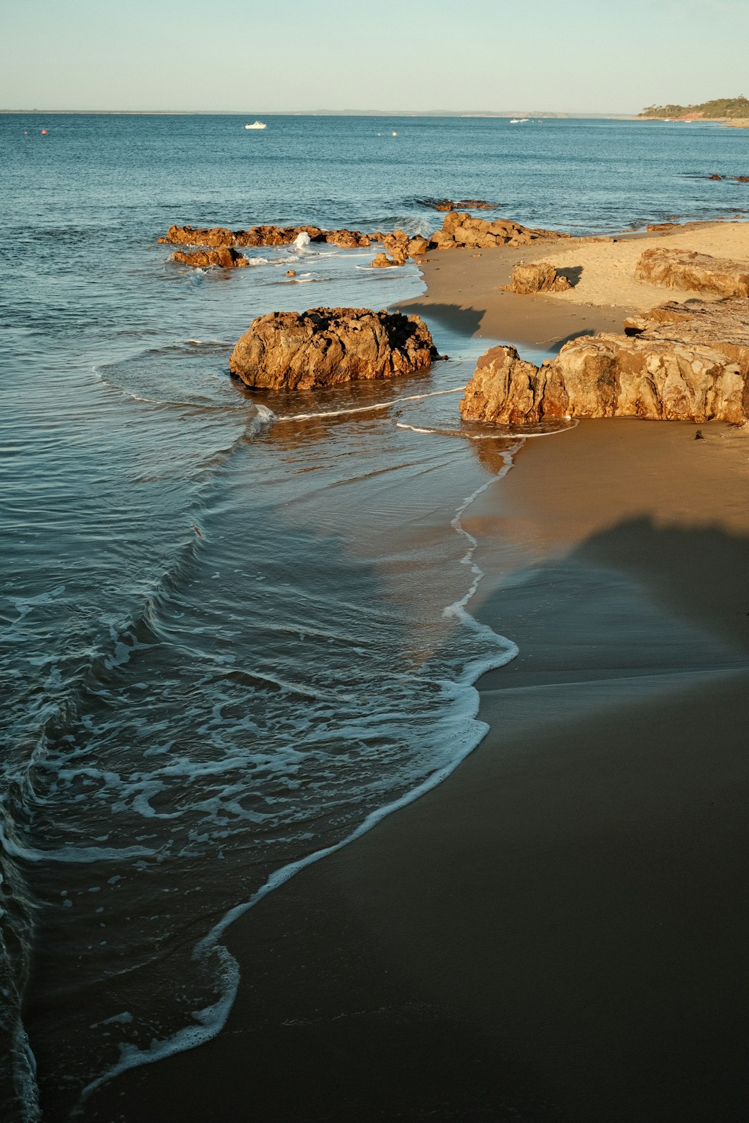 Serene empty beach coastline at golden hour
