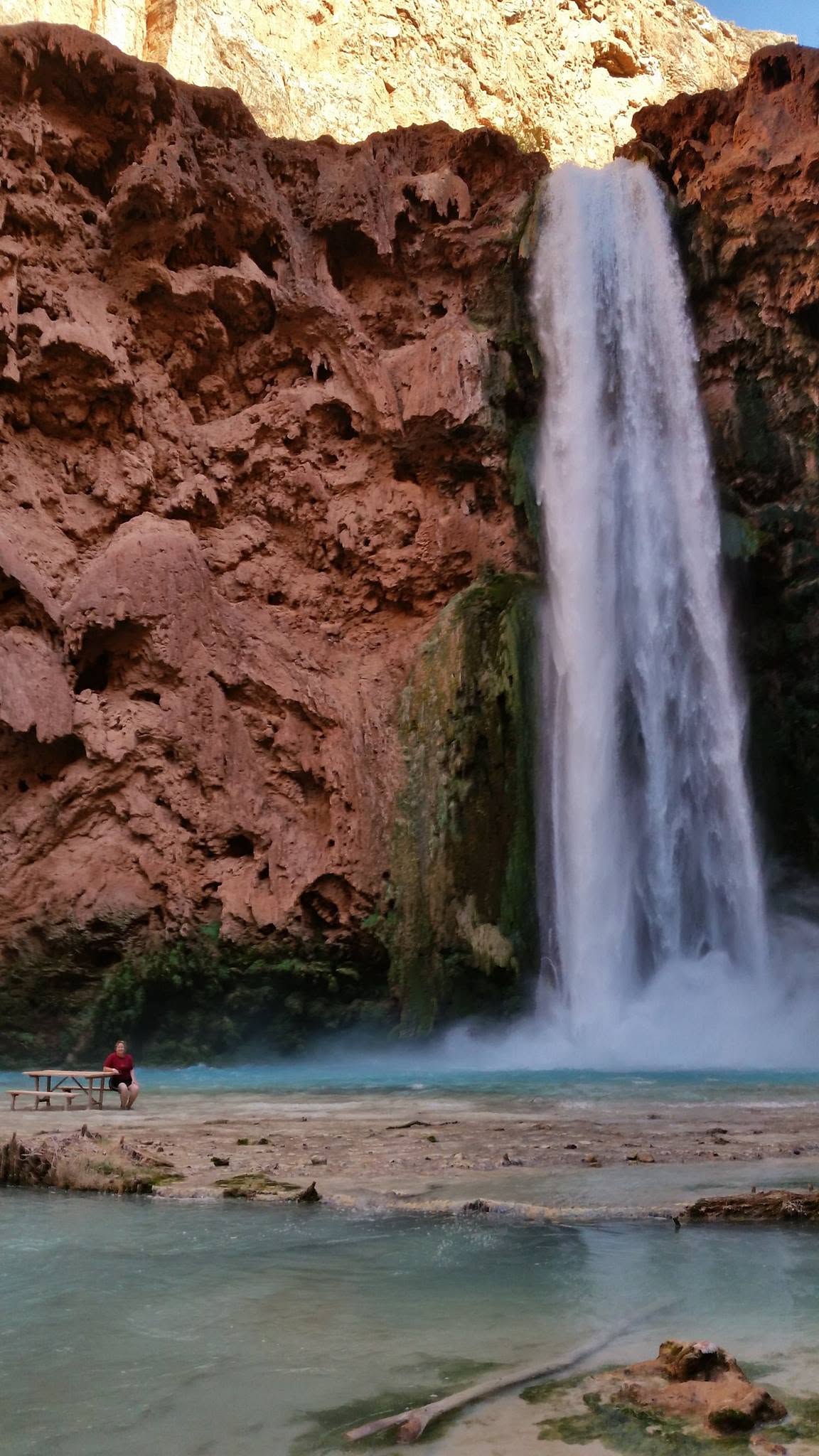 Mooney Falls plunging into turquoise water in the Havasupai canyon, Arizona